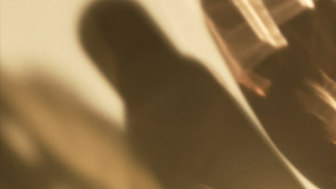 Shadow and play of light on bottles of oil